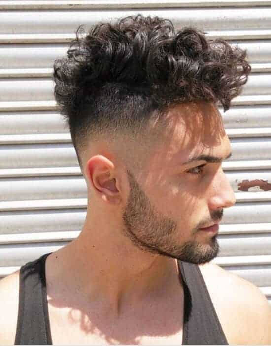 Curly Faux hawk with a burst fade