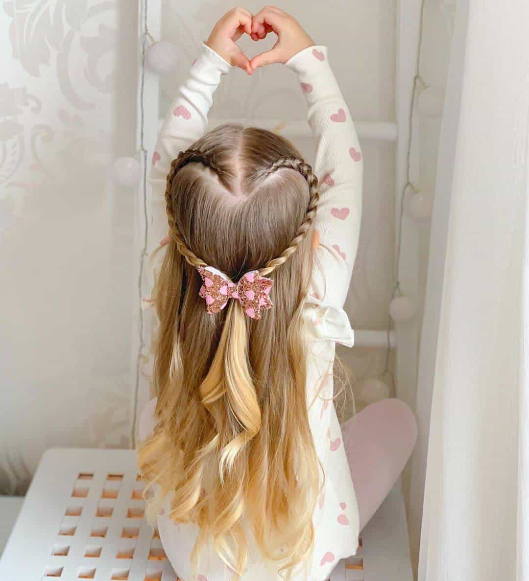 Heart braids with curly ponytail