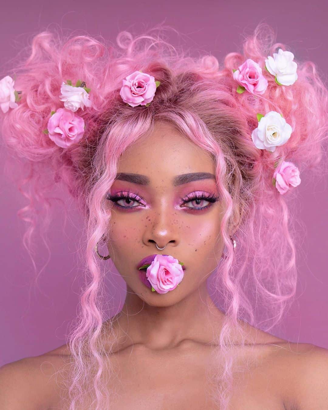 Pink curly hair of libra zodiac sign