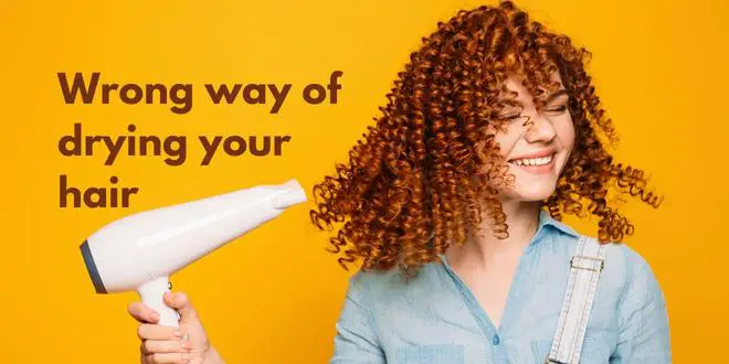 women drying her hair