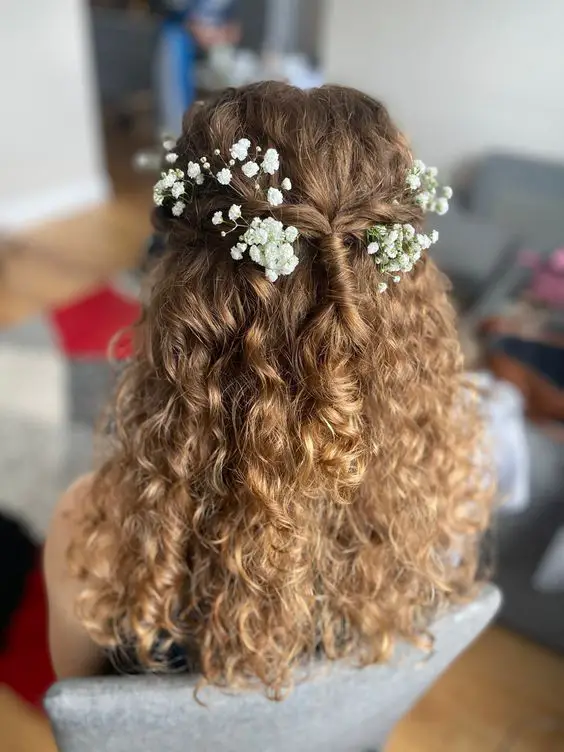 half up half down hairstyle with  accessories