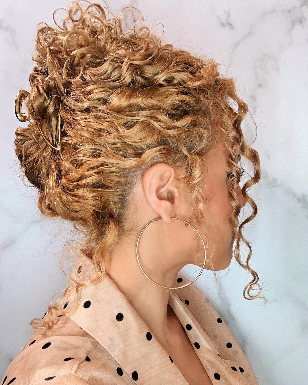 An artful spiral curls bun