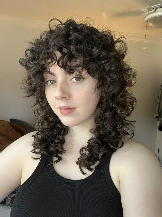 curly mullet hair with bangs